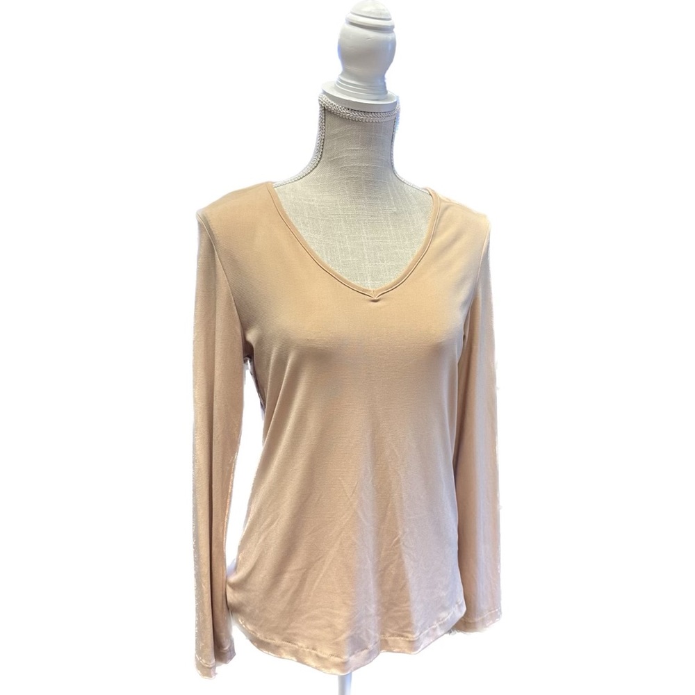 Beige long sleeve top.